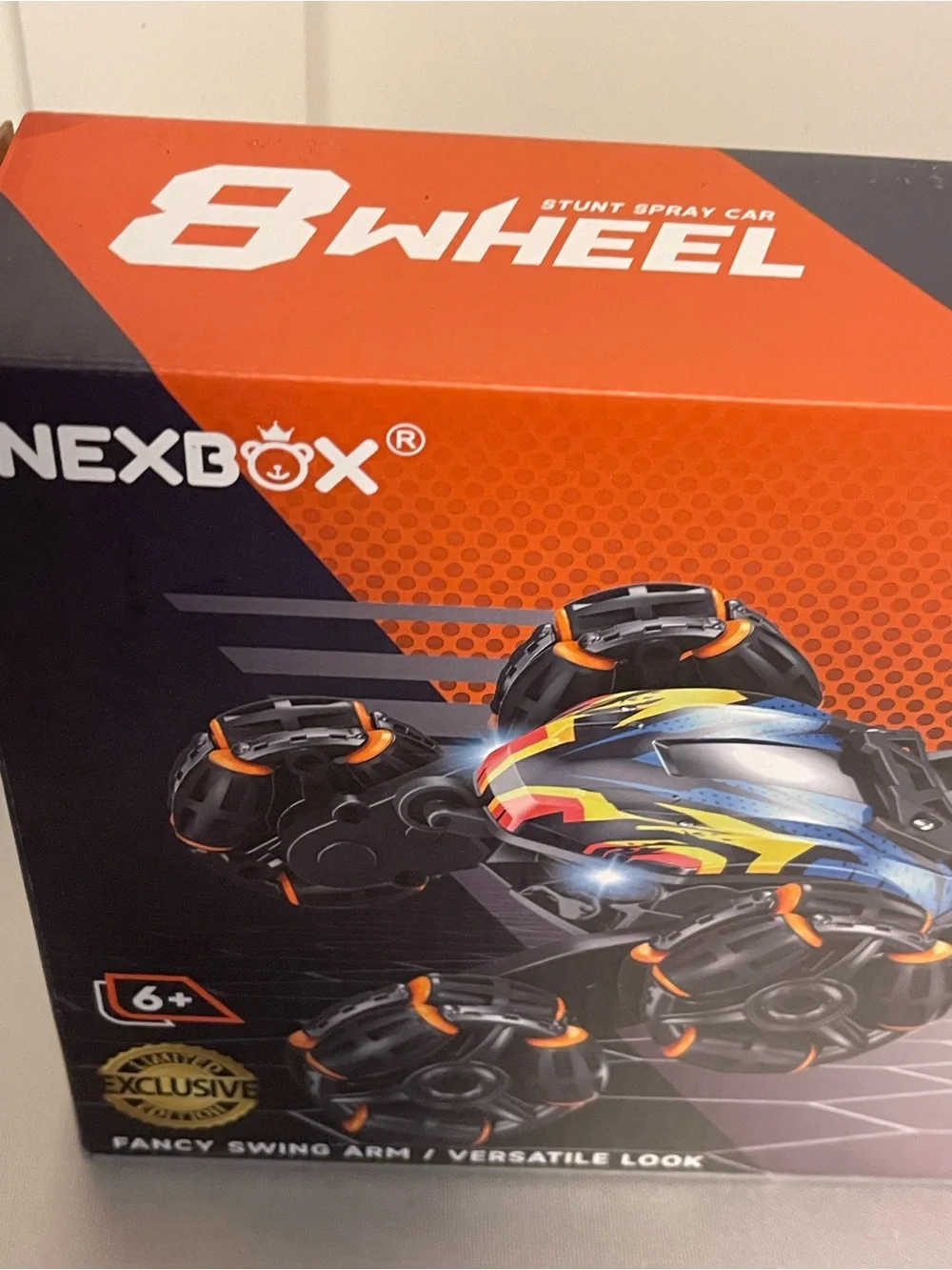 Nexbox 8-Wheel Stunt Spray RC Car - Black with Orange Accent NIP